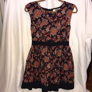 Auburn colored sleeveless cocktail dress